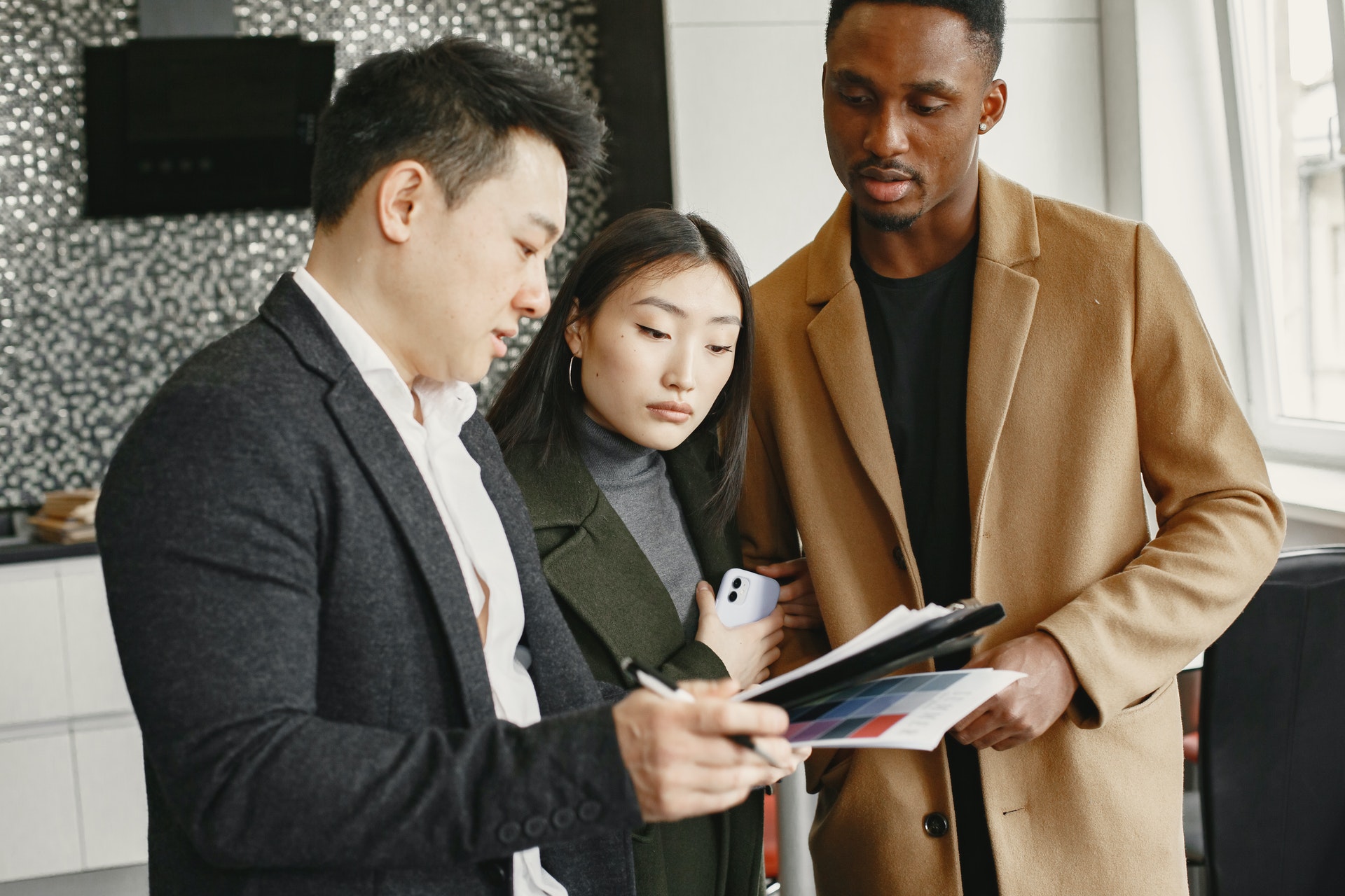 asian brown couple with document