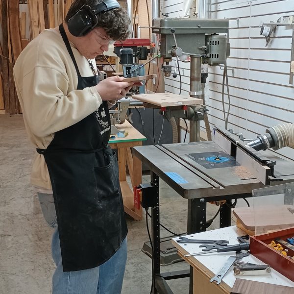 Student Examines Work